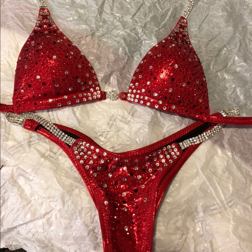 NPC bikini suit worn once. In great condition. Top is a B cup & small bottoms